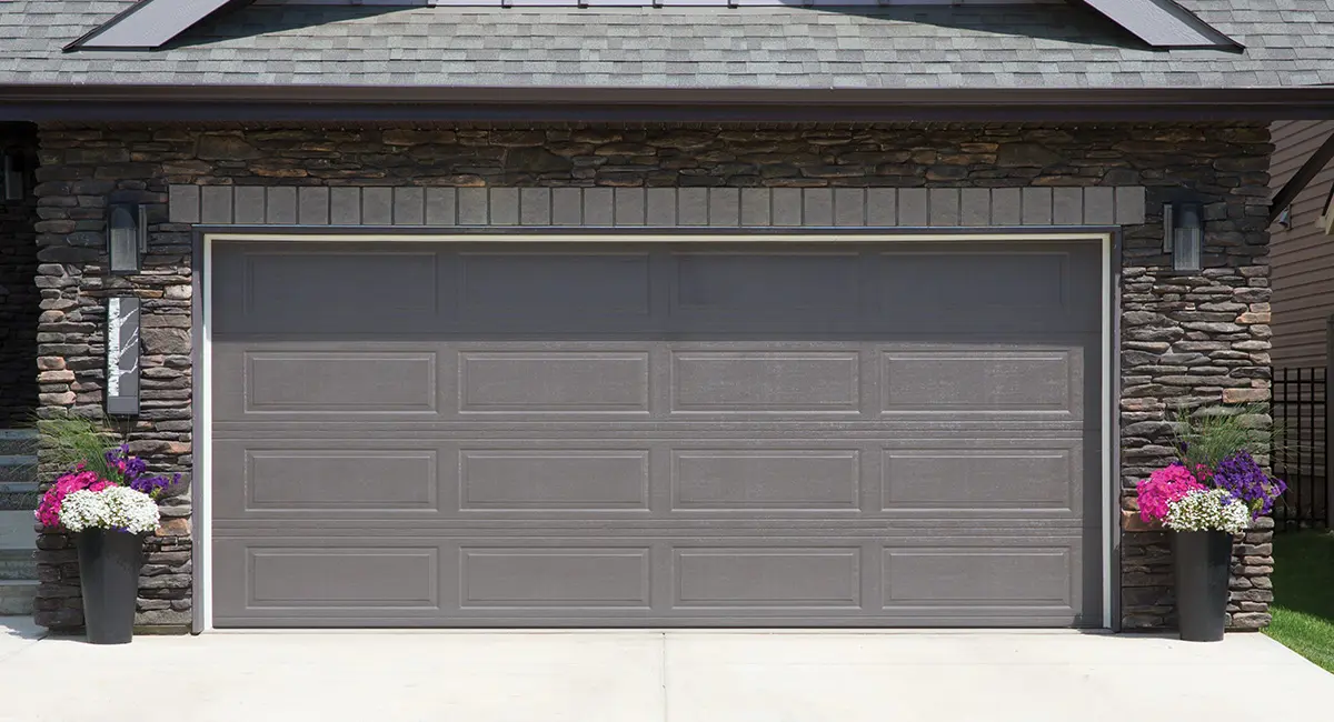Steel Garage Doors: Durability, Repair & Installation